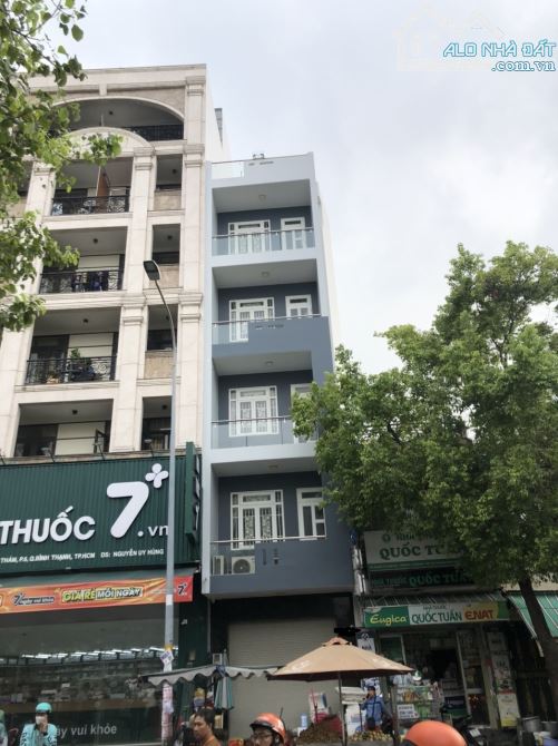 Bán gấp MT Hoàng Hoa Thám, P6, BT, 5m x21m CN 105m2, 7 tầng thang máy,  giá 23,5 tỷ