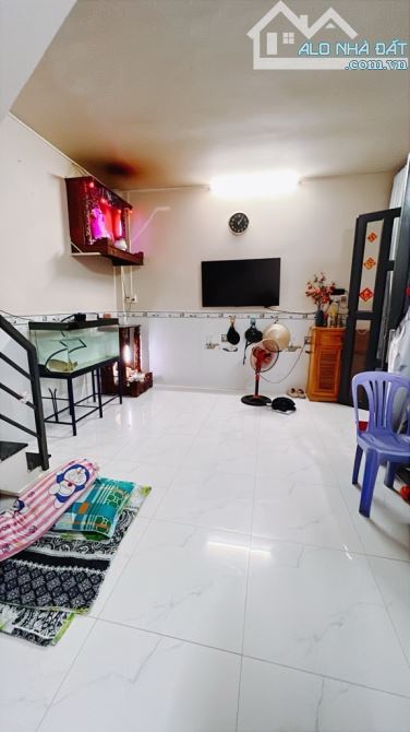 Ngay Kiều Đàm Quận 7, nhà nhỏ có Sổ hồng riêng,2 tầng- 24m2,chưa đến 3 t/y - 1