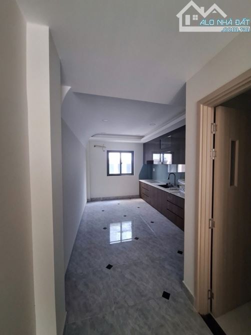 Mặt tiền KD Nguyễn Đình Chính, PN, 4 tầng mới 100%, 5PN, 6WC, sổ A4, 56m2 nhỉnh 15 tỷ - 1