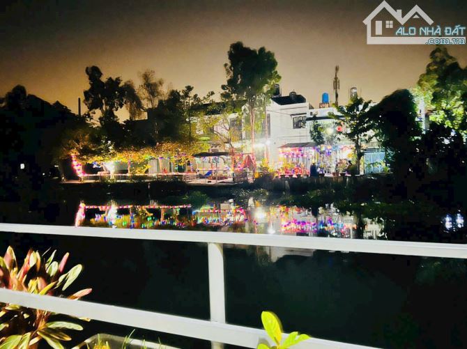 Bán đất sổ hồng riêng mặt tiền đường sông Vàm Thuật, phường Thới An, Quận 12 cũ, Dt 4x25 m - 2