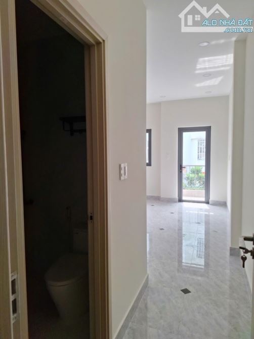 Mặt tiền KD Nguyễn Đình Chính, PN, 4 tầng mới 100%, 5PN, 6WC, sổ A4, 56m2 nhỉnh 15 tỷ - 2