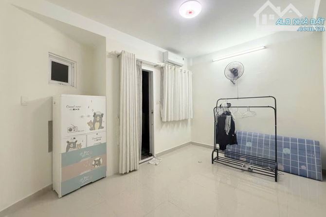 Bán nhà Đoàn Thị Điểm, Xe hơi, 25.8m² (4m x 7m), 5 phòng ngủ, 5 Tầng - Giá 7.7 tỷ TL - 5