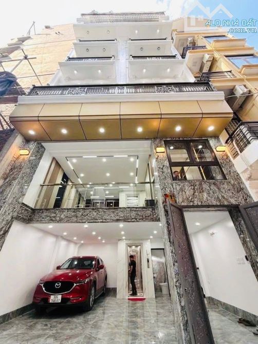Bán Nhà Giảng Võ , mặt ngõ ô tô thông , kinh doanh đỉnh , thang máy , gara ô tô 7 chỗ