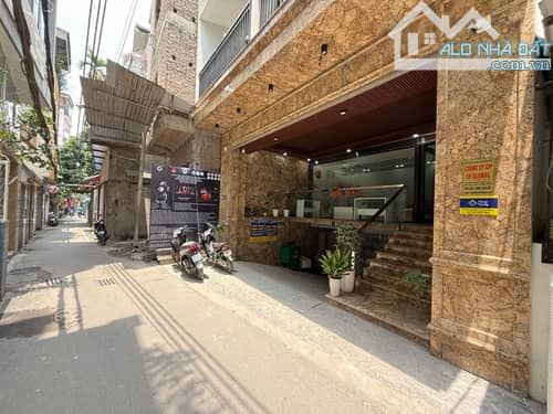 Bán tòa nhà văn 248m2 ôtô tránh tại Phố Xuân La 8 tầng 1 hầm - 1