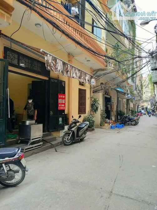 Bán gấp nhà 3 tầng 35m2, mặt tiền 7m, lô góc ngõ Ô-to 127 Văn Cao;Giá 15 tỷ - 1