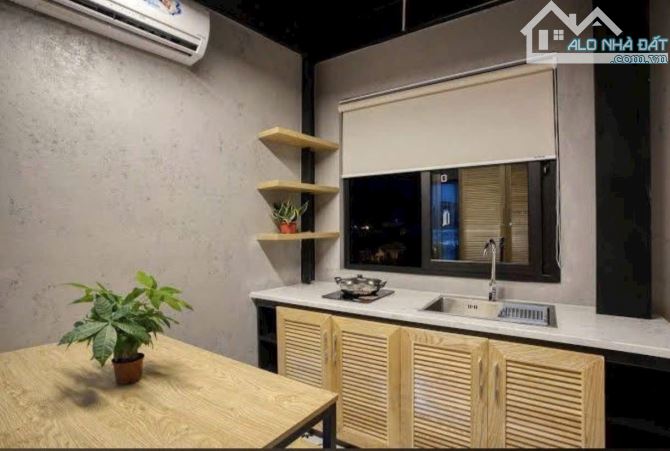 Bán khách sạn 7 tầng mới keng ngay trung tâm thành phố Đồng Hới - 1