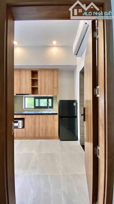TOÀ CĂN HỘ 4 TẦNG CĂN GÓC 2 MẶT TIỀN ĐƯỜNG KHUÊ MỸ ĐÔNG 14, NGAY HỒ XUÂN HƯƠNG - VÀI BƯỚC - 4