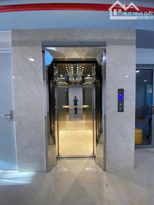 Bán tòa CHDV- Văn phòng ngay Trần Hưng Đạo, sát cầu Rồng, 100m2 MT 7m x 7 tầng DT 100tr/th - 4