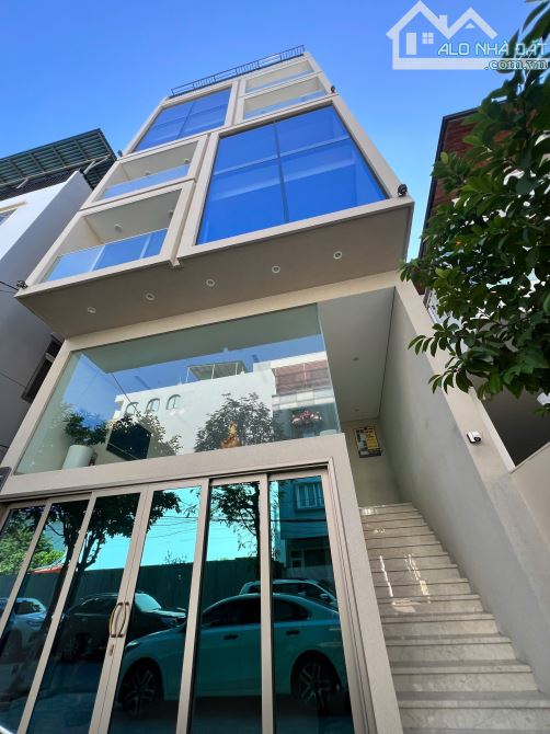 Bán tòa CHDV- Văn phòng ngay Trần Hưng Đạo, sát cầu Rồng, 100m2 MT 7m x 7 tầng DT 100tr/th - 5