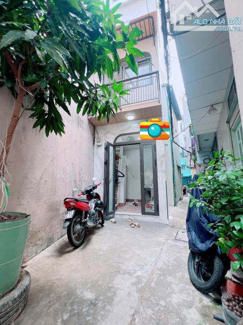 Nhà 4 tầng - sd 28m2 - Hẻm xe hơi - Đường Số Quận 4.