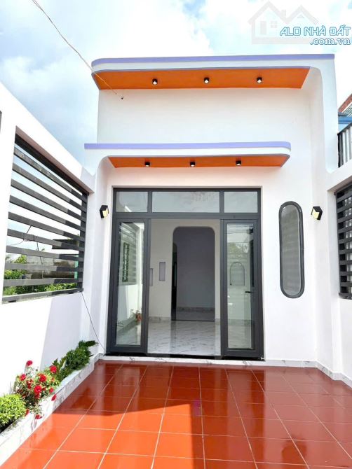Nhà 100m2 4*25 SHR mặt tiền đường Tập Đoàn 8 Mỹ Lộc Cần Giuộc xe hơi vivu - 1
