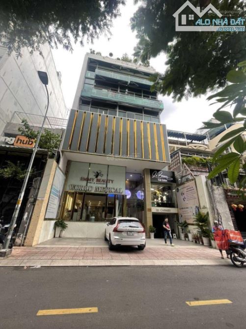 bán nhà mặt tiền bà huyện thanh quan ,Quận 3. DT: 10x14 nở hậu 15m , 4 tầng , giá 85 tỷ TL - 1