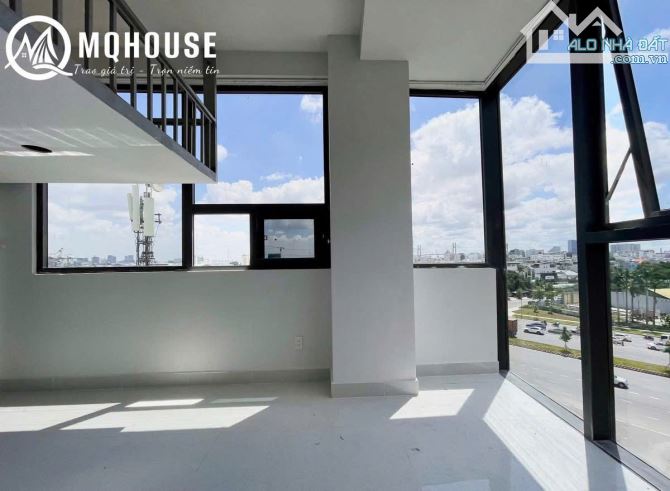 CHDV  8x18m Hầm 7 lầu 30p TN 150tr/tháng Đường Nguyễn văn Linh Quận 7 - 2