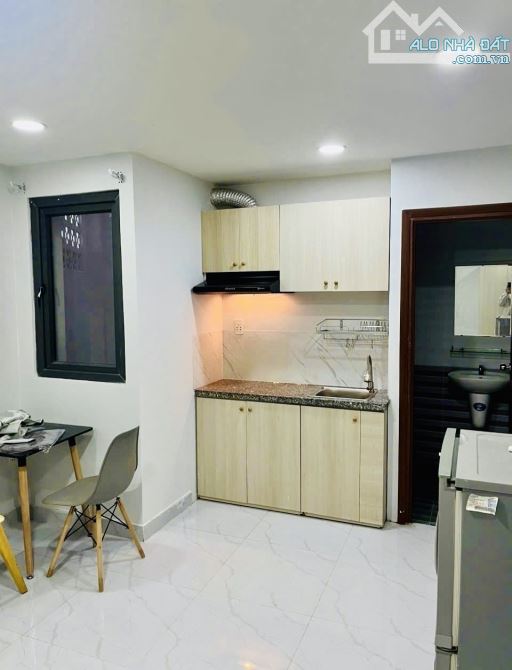 CHDV 13 PHÒNG- LÊ QUANG ĐỊNH- 6 TẦNG- NGANG 5M, NỞ HẬU- 15,x TỶ - 4