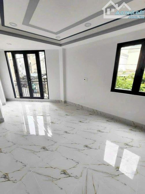 NHỈNH 6 ĐỒNG CÓ NHÀ ĐẸP 5 TẦNG HXH THÔNG PHÚ NHUẬN 4PN5WC - 4