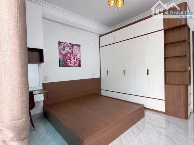 Cần bán nhà 3 tầng dt 64m2, mặt 4,1m, nở hậu, hướng Tây. Vị trí ngõ Vũ Hựu thông các ngả - 5