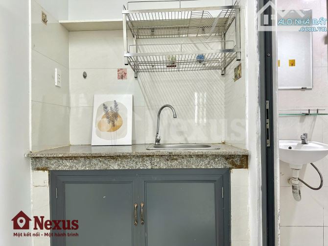 CHDV  8x18m Hầm 7 lầu 30p TN 150tr/tháng Đường Nguyễn văn Linh Quận 7 - 6