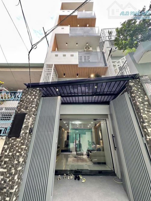 BÁN NHÀ PHAN XÍCH LONG 5 TẦNG - 4X15, 5PN SIÊU ĐẸP GIÁ 13TY500