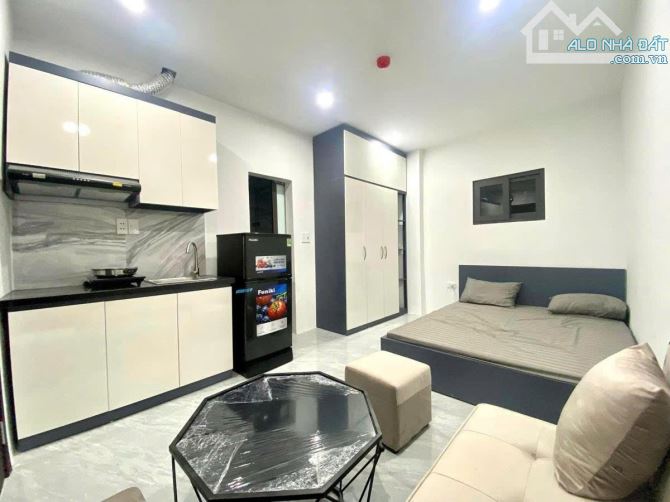 Tòa Nhà Dòng Tiền phố Bùi Xương Trạch, 68m2, 7 tầng, 18 phòng, 20m ra ô tô, giá 15.5 tỷ