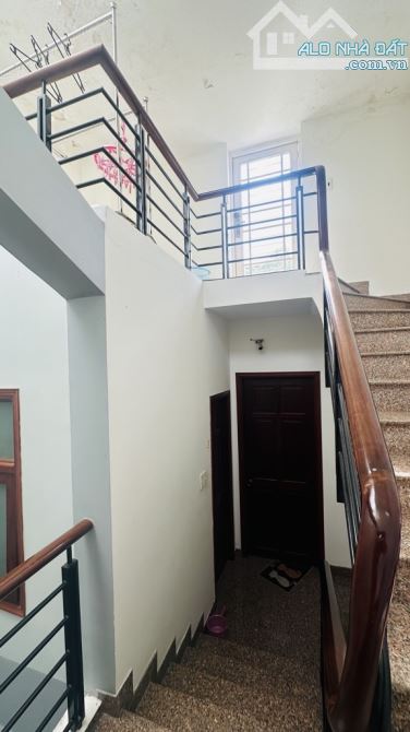 Mặt tiền Quang Trung ngay chợ Hạnh Thông Tây gần 100m2 đúc 5 tầng giá 15,5 tỷ TL đường 10m - 17