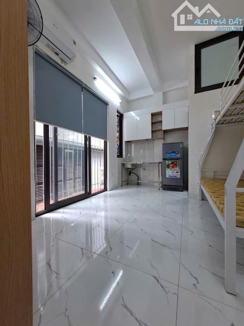 Tòa Nhà Dòng Tiền gần Nguyễn Khánh Toàn, 83m2, 8 tầng, 24 phòng cho thuê, giá 17.5 tỷ - 2