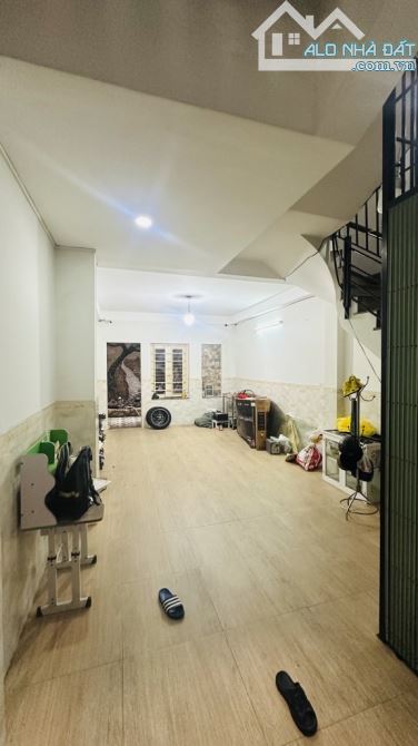 Mặt tiền Quang Trung ngay chợ Hạnh Thông Tây gần 100m2 đúc 5 tầng giá 15,5 tỷ TL đường 10m - 5