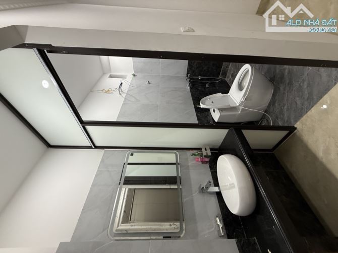 Trần Đại Nghĩa - mặt ngõ ô tô, ngõ thông, kinh doanh - 5 tầng thang máy xây mới.