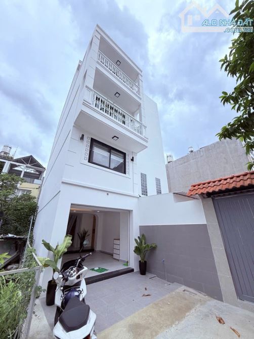 Nhà mới xây  100%  5 tầng  2 mặt hẻm xe hơi Thống Nhất  Gò Vấp  4x15m  Giá  7.9Tỷ