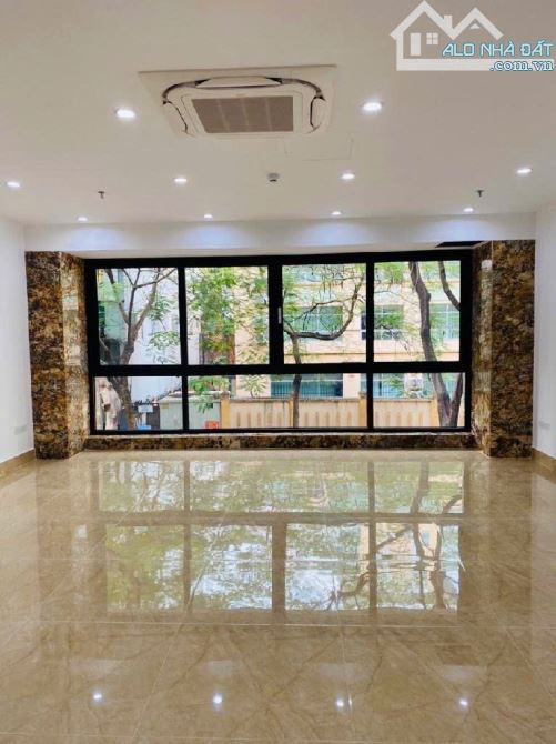 TOÀ NHÀ VĂN PHÒNG KINH DOANH MẶT PHỐ NGUYỄN NGỌC NẠI 100m-8 TẦNG-THANG MÁY - 1
