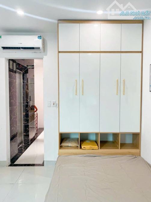 Tòa CCMN Khương Đình 53m2, 6T, 30m  ra ô tô, 15 phòng kk, DT 700tr/năm, giá 15 tỷ - 2