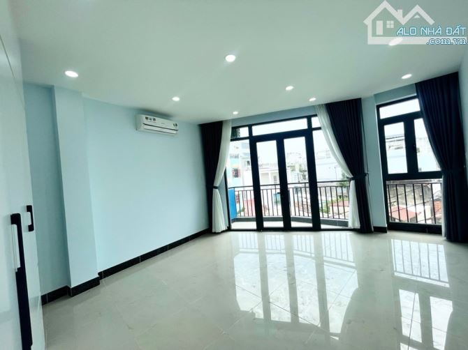 BÌNH THẠNH MẶT PHỐ NGUYỄN KHUYẾN 40M² 6 TẦNG 5PN LÔ GÓC 9 T - 3