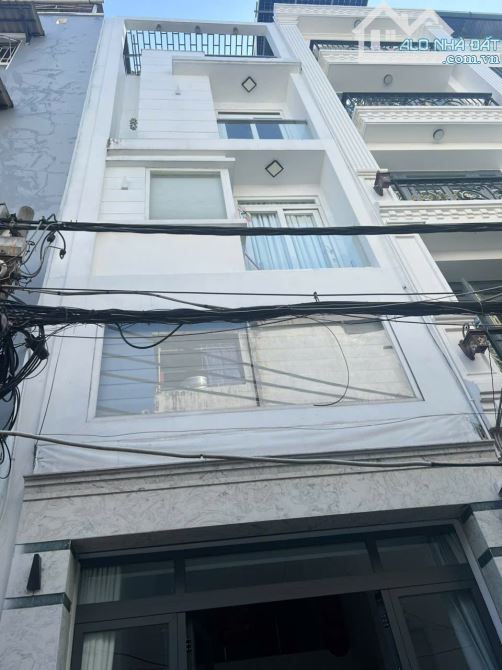 Bán nhà 4 tầng,đẹp như mới, 6 phòng ngủ - đường An Bình, Q5