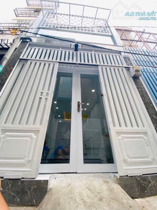 NHÀ MỚI Ở NGAY TRUNG TÂM PHAN XÍCH LONG  - CÁCH VÀI CĂN RA MẶT TIỀN - 1