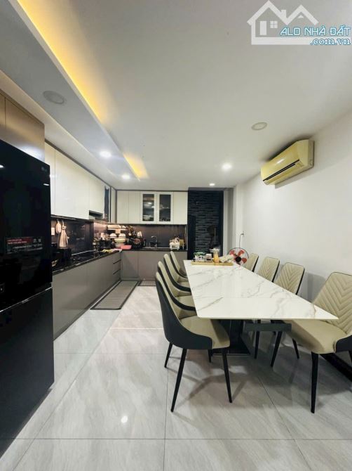 Bán nhà 4 tầng,đẹp như mới, 6 phòng ngủ - đường An Bình, Q5 - 2