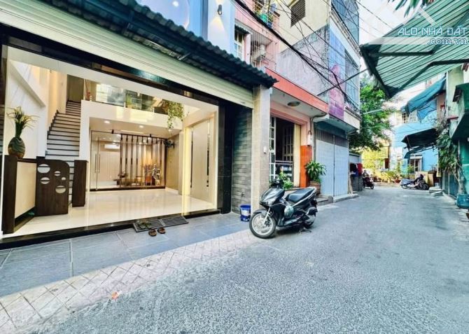 BÁN NHÀ SÁT MT LÊ ĐỨC THỌ, ĐƯỜNG HXT RỘNG SẠCH ĐẸP NHỰA 1 TRỆT LỬNG 2 LẦU ST MỚI ĐẸP - NGA - 3