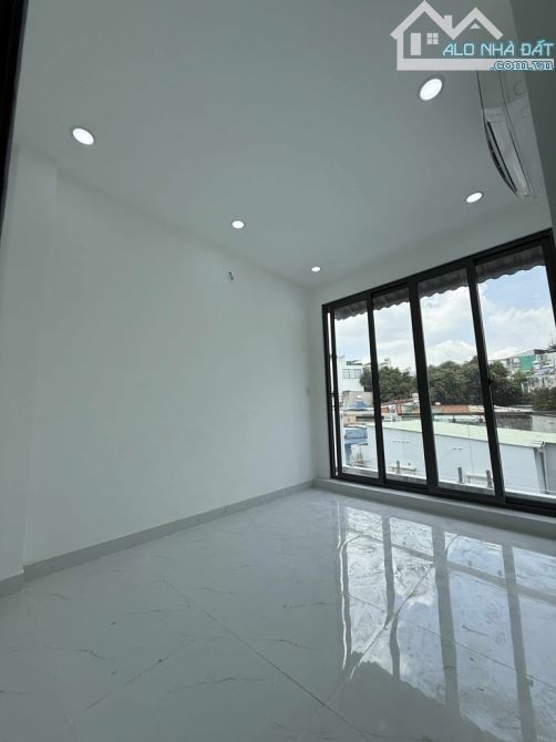 Bán nhà mới 3 tầng, mặt tiền đường trung tâm phường 7, Gò Vấp, chỉ 4,7 tỷ. - 4