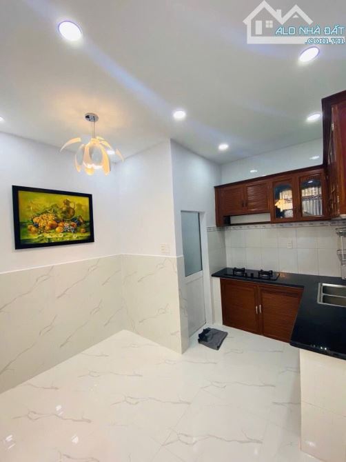 NHÀ MỚI Ở NGAY TRUNG TÂM PHAN XÍCH LONG  - CÁCH VÀI CĂN RA MẶT TIỀN - 4