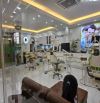 Bán nhà MP Nguyễn Hữu Thọ, lô góc vỉa hè, kinh doanh, thang máy, 120m 7T, MT 8m, giá 97 tỷ