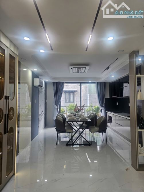 Nhà 5 tầng hẻm xe hơi 4m diện tích 4x15,5m đủ 62m2 đường Lê Đức Thọ Phường 13 Gò Vấp 8,88T - 11