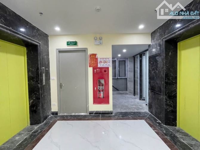 Bán tòa nhà 8 tầng, 1 hầm mặt đường Khương Đình 150m2, mặt tiền 6,2m, thang máy, 300tr/th - 1