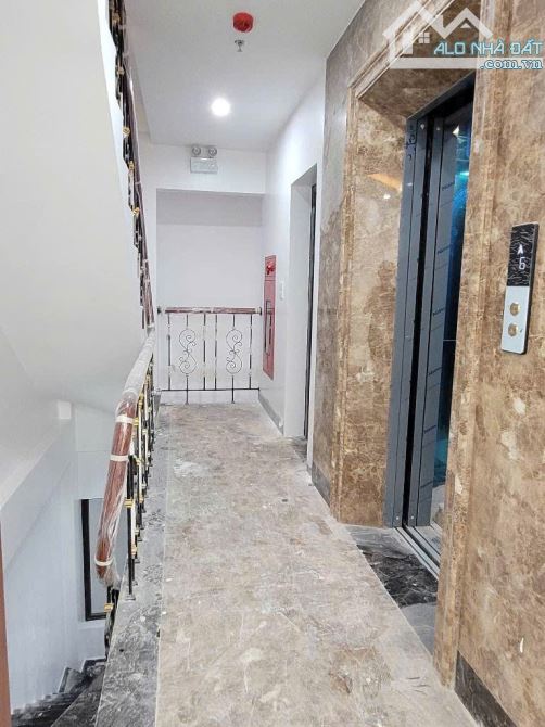 TÒA NHÀ 9 TẦNG MẶT PHỐ NGUYỄN CHÁNH, 70M2, HẦM GARA, LÀM TRỤ SỞ, VĂN PHÒNG, SỔ ĐẸP - 1
