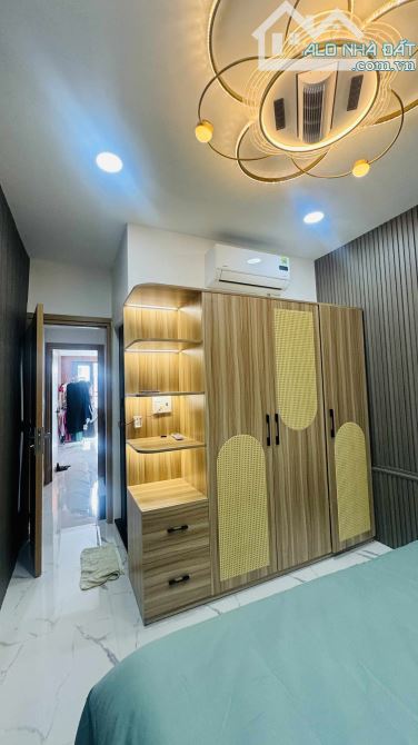 Bán nhà khu phân lô Quận 1- 4 Tầng đúc mới- 5PN+4WC- 30m ra Mặt Tiền- Sổ A4 hoàn công đủ. - 2