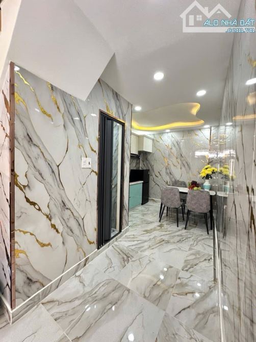 B.ÁN NH.À ĐẸP 4 TẦNG  - HẺM XE HƠI - QUẬN 5 GIÁP QUẬN 1  - DÒNG TIỀN 17 TRIỆU/THÁNG  - HƠN - 2