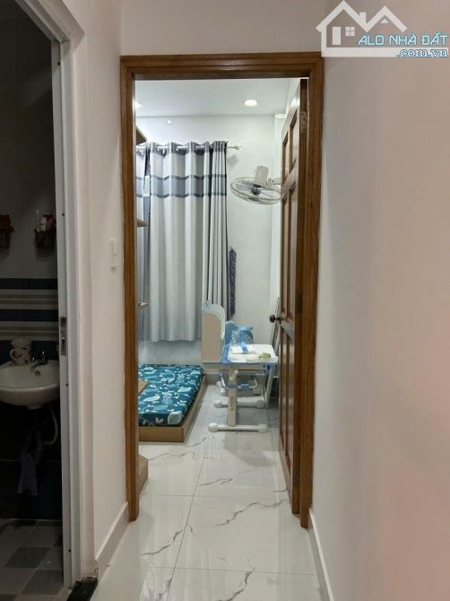 SIÊU PHẨM NHÀ ĐẸP 2 TẦNG FULL CÔNG NĂNG,dt 3,2x9 ,2pn ngay đường thống nhất giá chỉ 2,99t - 7