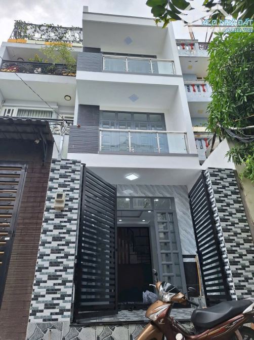 Bán nhà một trệt 2 lầu có hai phòng ngủ đường Nguyễn Quý yêm diện tích 4 x 10 giá 5,4 tỷ T