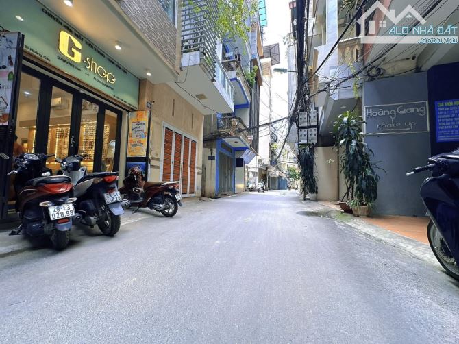 Bán nhà Hoàng Cầu NGÕ THÔNG - KINH DOANH - Ô TÔ  48m2  5 tầng mặt tiền 4.8m giá 16.9 tỷ