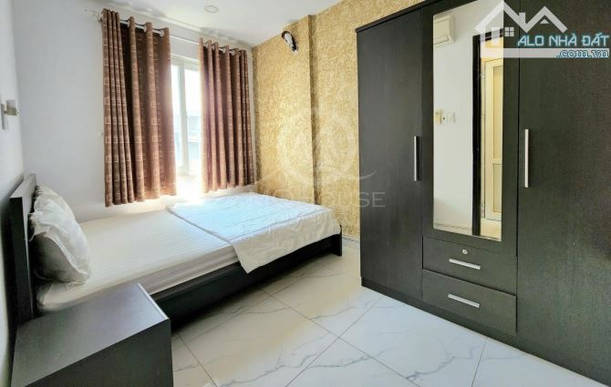 Bán tòa CHDV Trường Sơn sân bay 7x28m  1h6 tầng 200m2 giá chỉ 50 tỷ tl - 1