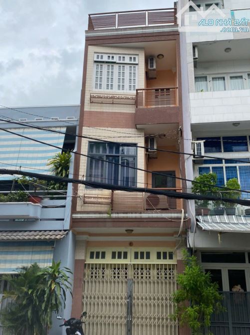 Cho thuê nhà nguyên căn mặt tiền Huỳnh Văn Bánh, P13, Quận Phú Nhuận.DT 3.5x9m. trệt, 3L.