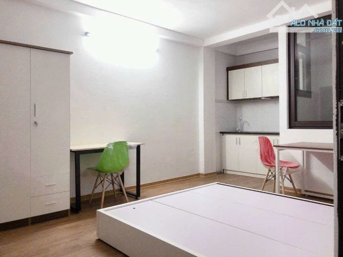 TÒA CCMN PHỐ HỒ TÙNG MẬU 100M2X7T, 26P DOANH THU CAO - 1