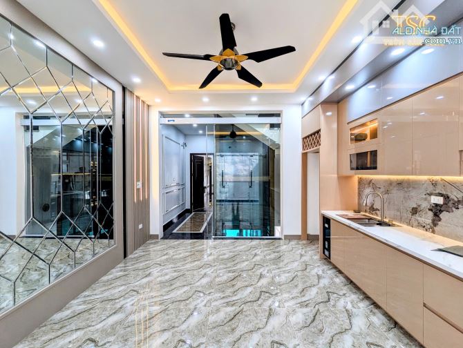 Nhà đẹp thang máy 5 tầng xây mới mặt đường Tô Vũ 193 Văn Cao - 1